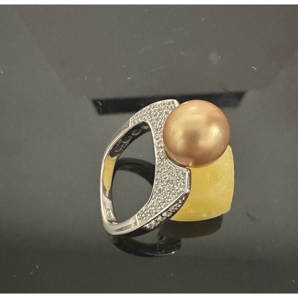 Size 7 Sterling Silver Champagne Pearl Ring With Zircon Accent Settings.